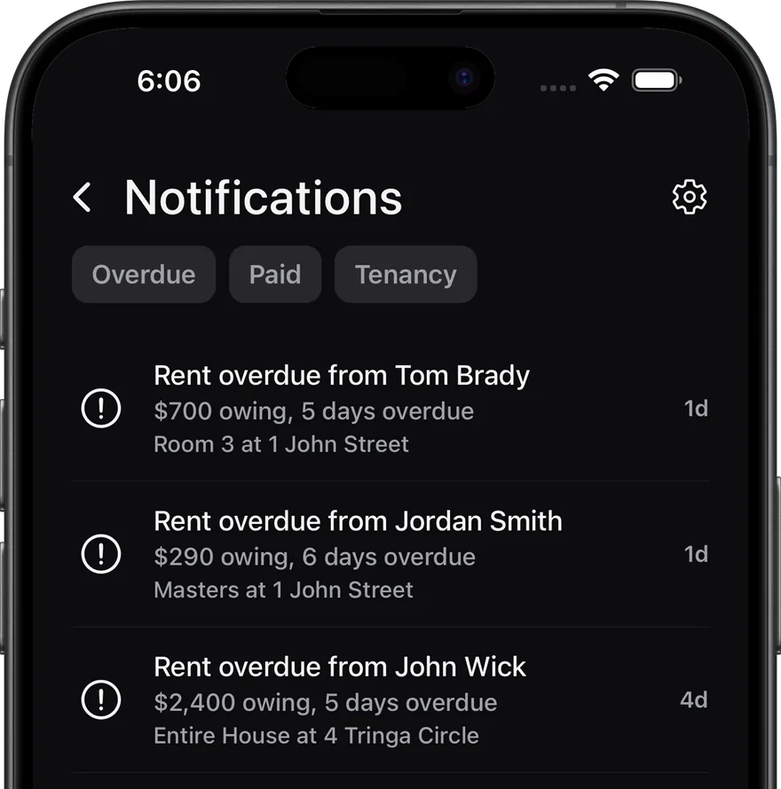 The Roomed app's notifications screen in dark mode, listing overdue rent by room and property
